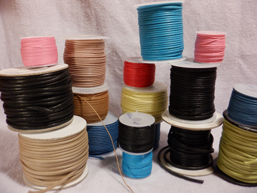 Fabric jewelry & craft cord in various colors and sizes.